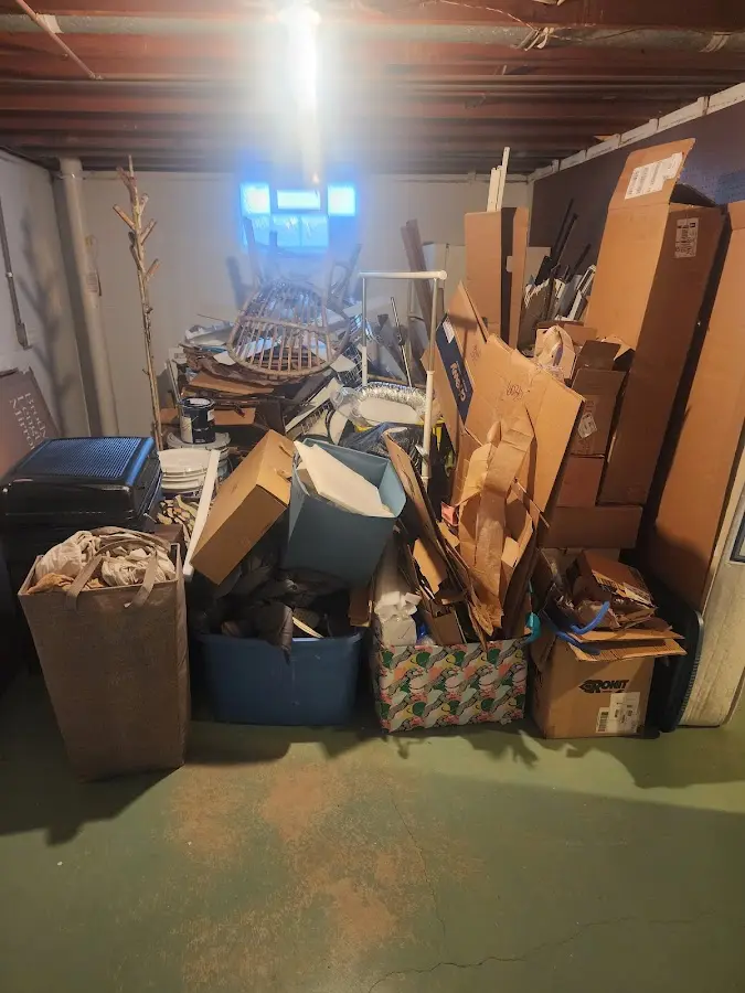 Roll-off dumpster container at job site for Yard Waste Dumpster Rental in Kimball